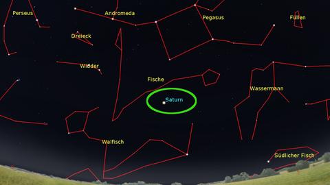 Eine Sternenkarte zeigt verschiedene Sternbilder und den Planeten Saturn