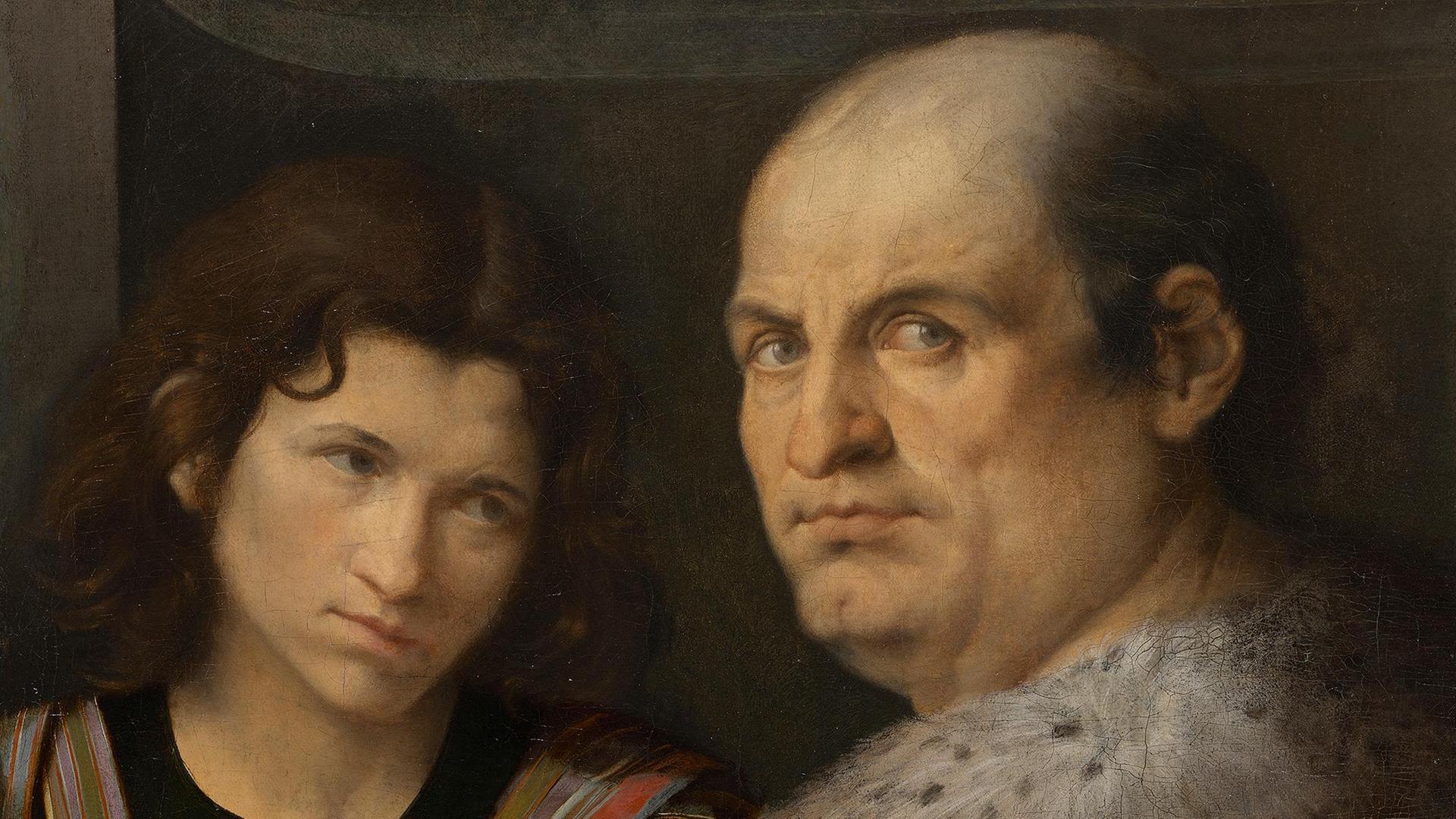 Das Doppel-Bildnis von Giorgione zeigt eine junge Frau, die einen Mann mit Glatze anblickt. Der Mann schaut den Maler an. 