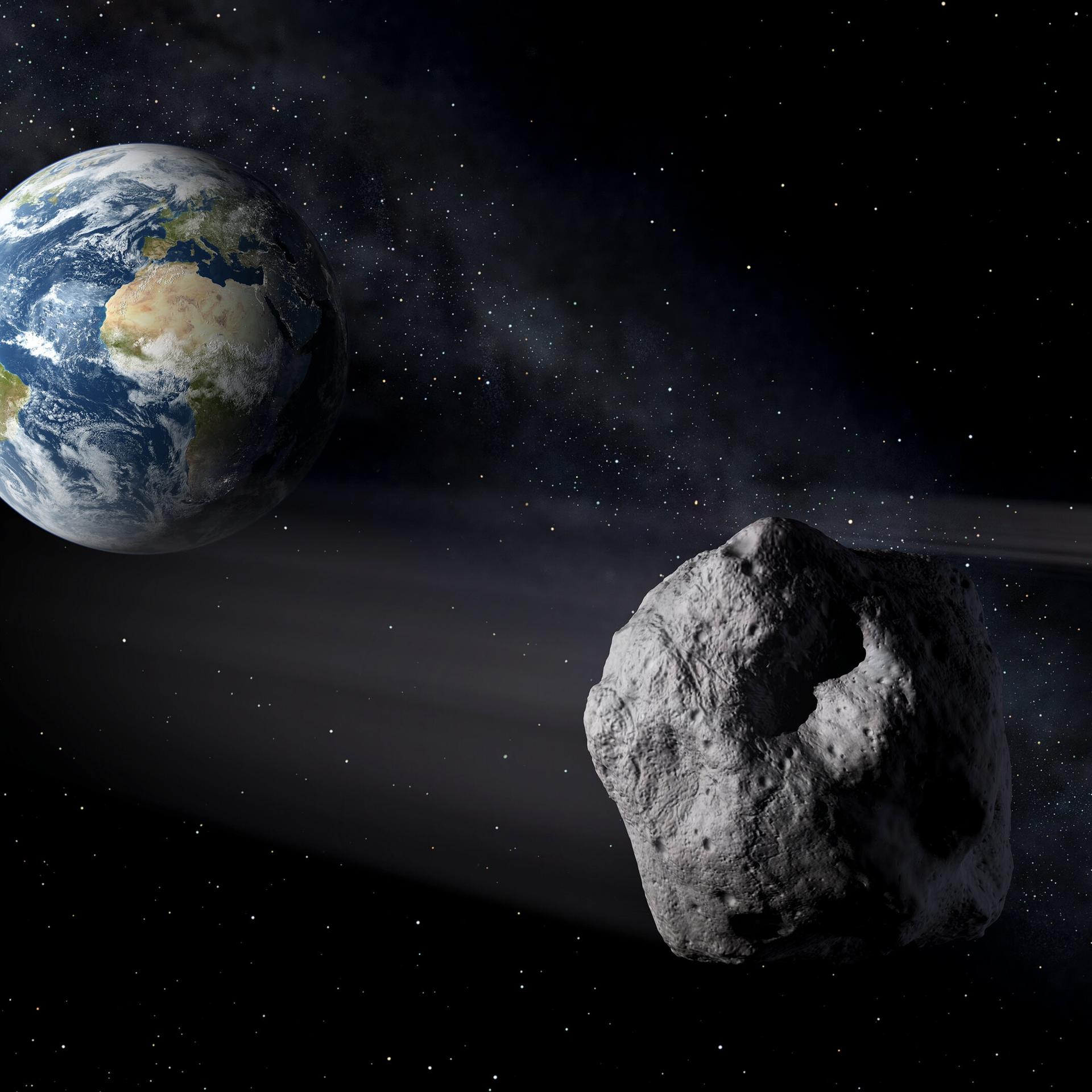 Die Illustration zeigt den Asteroid 2024 YR4, wie er sich Richtung Erde bewegt. 