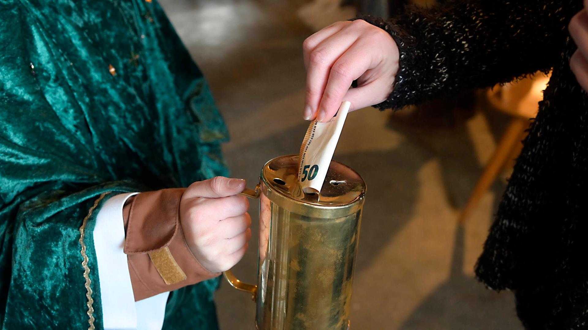 Der Klingebeutel geht um: eine Gabe für die Sternsinger am Dreikönigstag in München