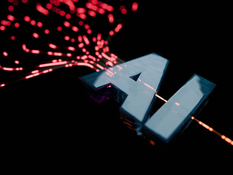 Digitaler Datenstrom, der zu einem futuristischen, leuchtend grünen KI-Text auf einem dunklen Hintergrund fließt. Die Grafik stellt maschinelles Lernen, neuronale Netzwerke und fortschrittliche Technologie im digitalen Zeitalter dar.