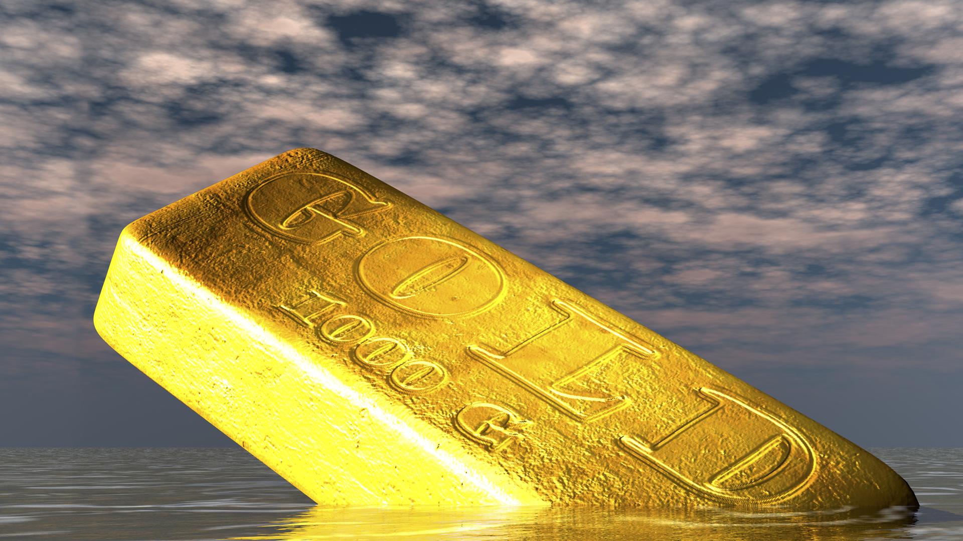 Zu sehen ist ein goldfarbener Barren mit der Aufschrift "Gold"