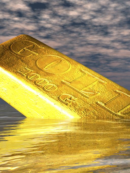 Zu sehen ist ein goldfarbener Barren mit der Aufschrift "Gold"