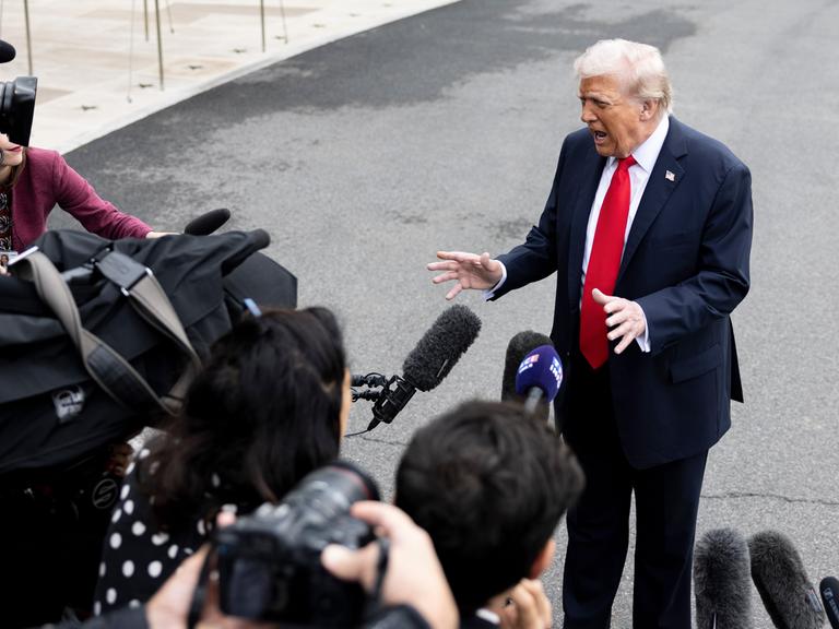 September 16, 2025, Washington, District Of Columbia, United States: U.S. President Donald Trump speaks to members of the press as he daparts the White House en route to the United Kingdom on September 16, 2025 in Washington D.C. September 16, 2025, Washington, District Of Columbia, United States: U.S. President Donald Trump speaks to members of the press as he daparts the White House en route to the United Kingdom on September 16, 2025 in Washington D.C.