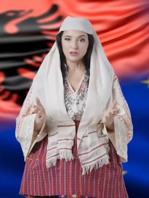 "Diella" ist eine KI-generierte Ministerin. Zu sehen ist eine junge Frau in traditioneller albanischer Tracht