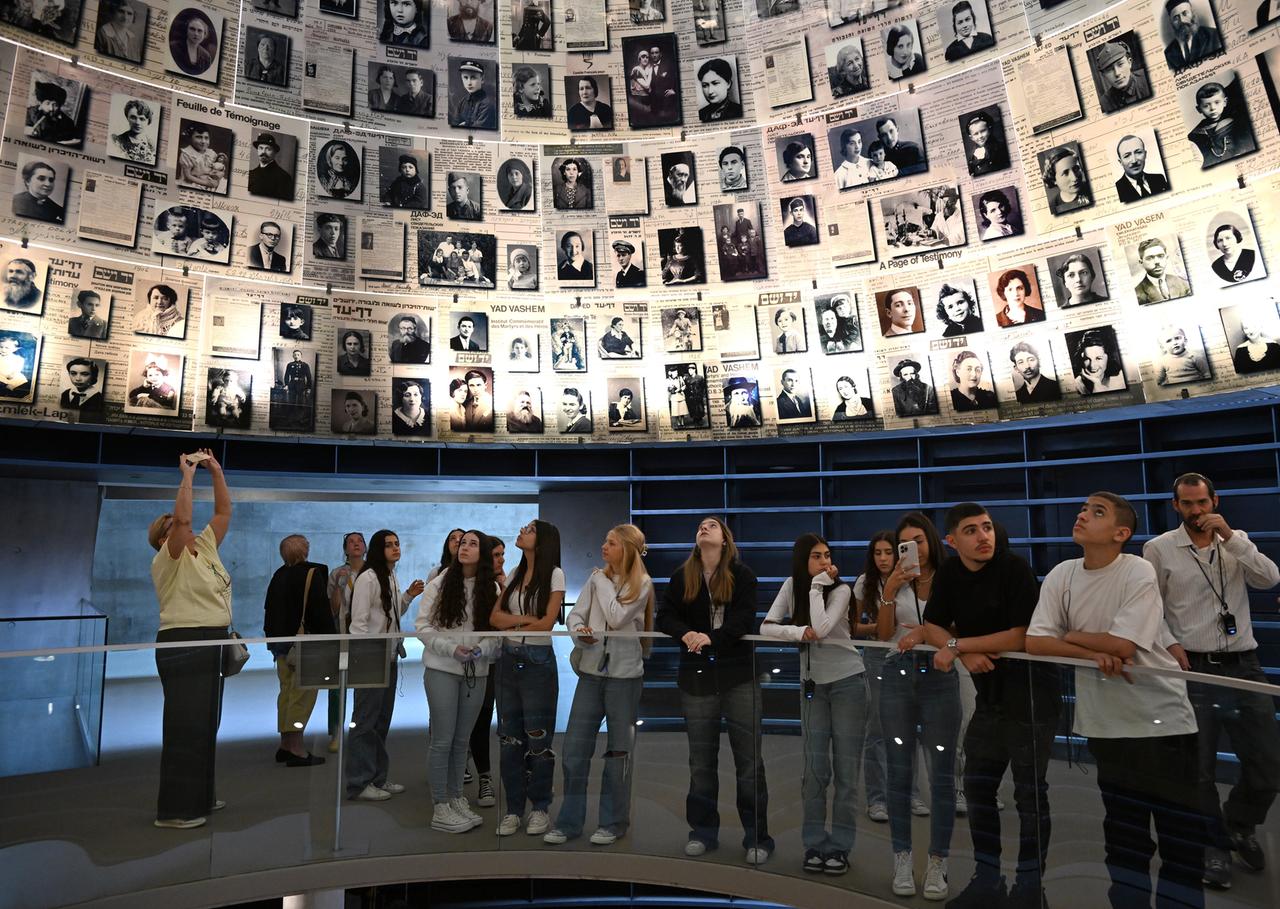 People visit Yad Vashem, the World Holocaust Remembrance Center, on the eve of Yom HaShoah, Holocaust Martyrs' and Heroes' Remembrance Day for the six million Jews killed by Nazi Germany, that begins at sundown on Sunday, May 5, in Jerusalem. 