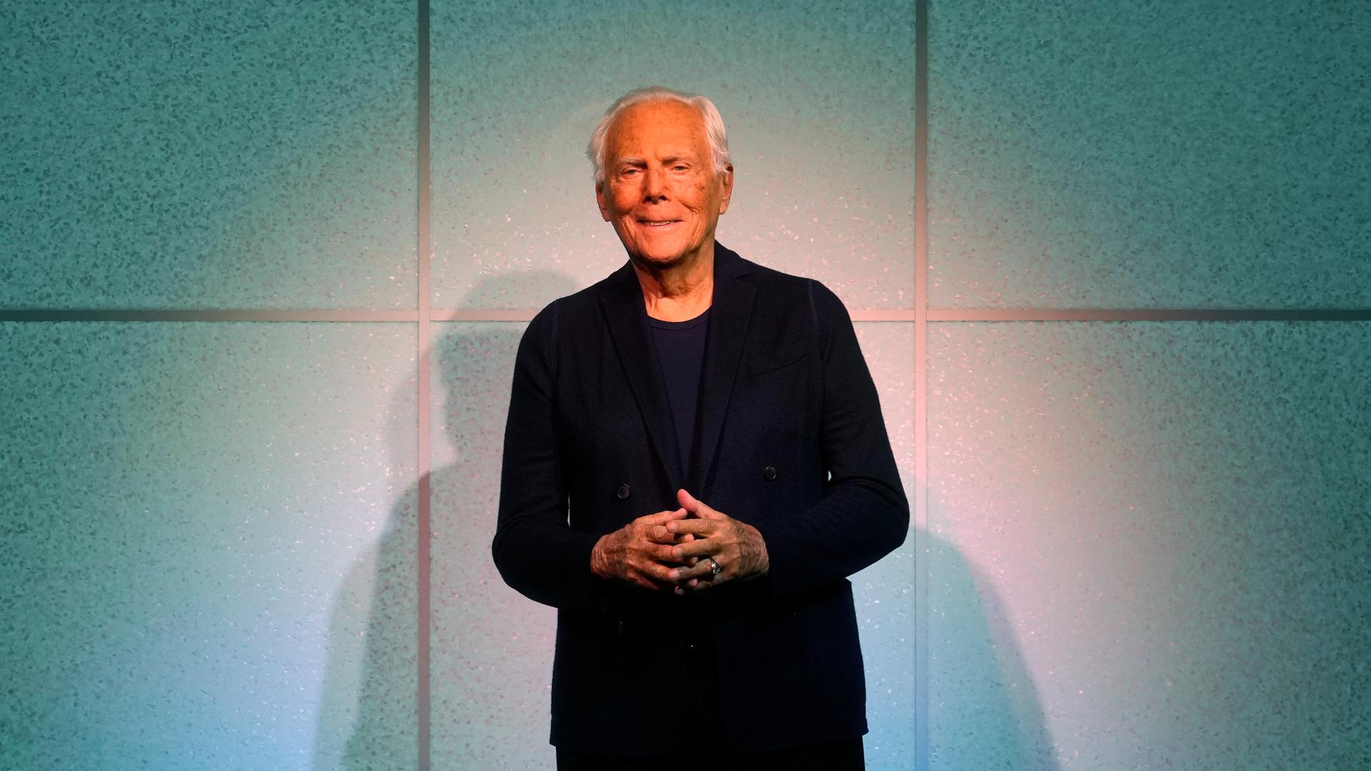 Designer Giorgio Armani accepts applause after the conclusion of his women's Fall-Winter 2024-25 collection presented in Milan, Italy, Sunday, Feb. 25, 2024. (AP Photo/Luca Bruno) Designer Giorgio Armani accepts applause after the conclusion of his women's Fall-Winter 2024-25 collection presented in Milan, Italy, Sunday, Feb. 25, 2024. (AP Photo/Luca Bruno)