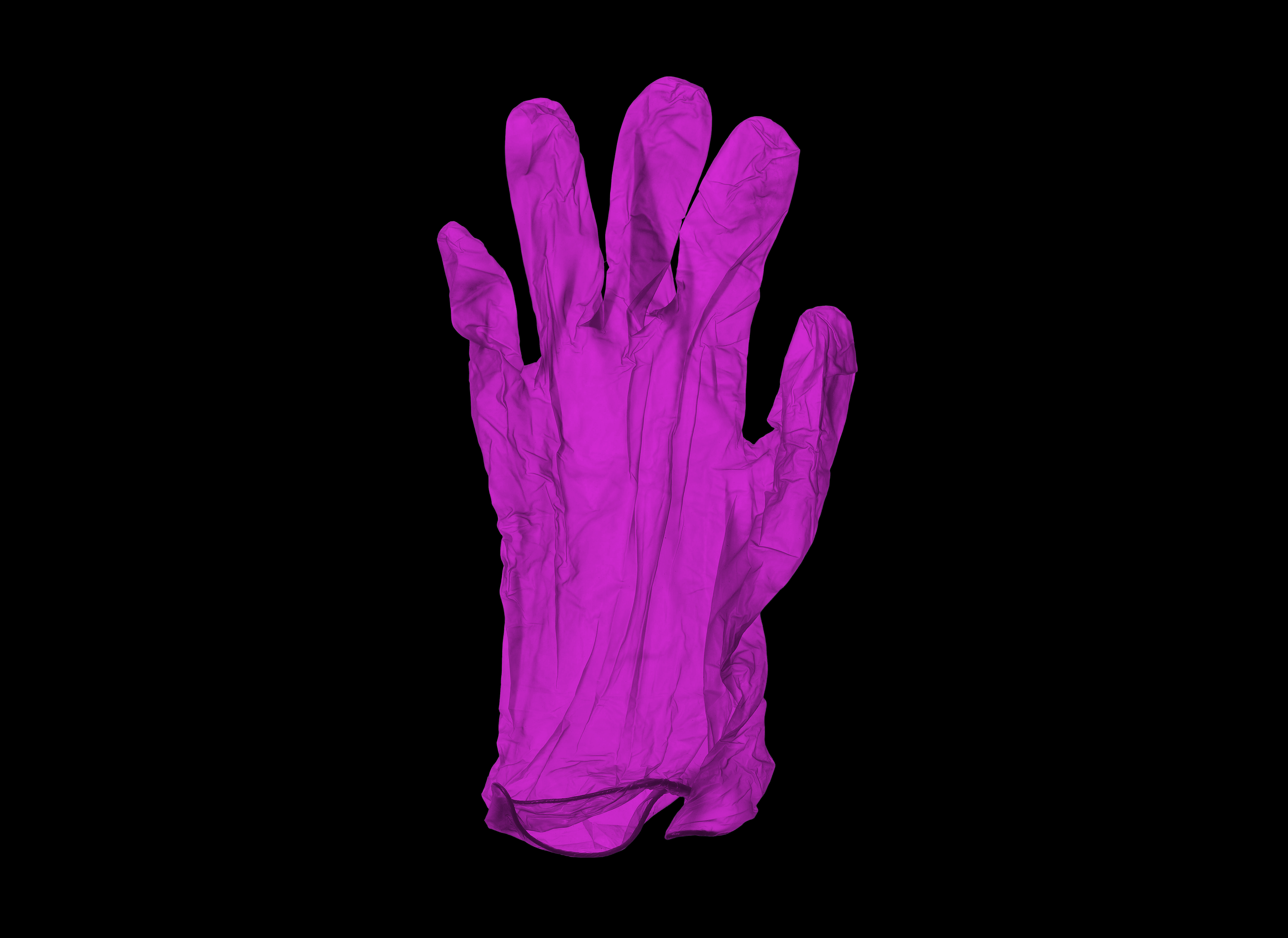 Ein Paar pinke Gumminhandschuhe auf schwarzem Grund