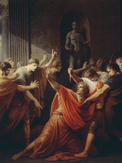 Auf dem Gemälde von Friedrich Heinrich Füger wird Julius Cäsar von umstehenden Männern erstochen.