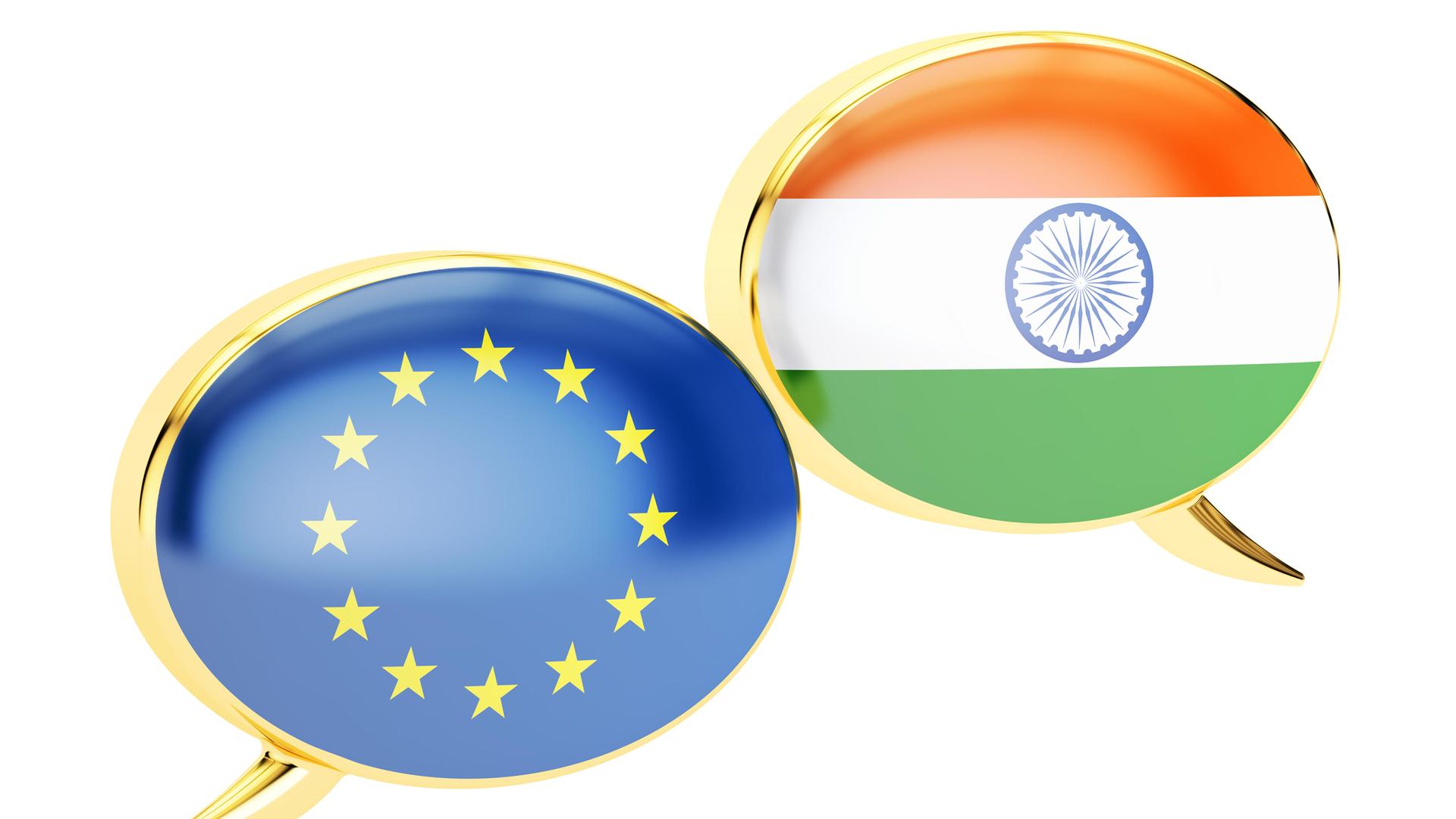 Die Fahnen der EU und Indiens sind symbolisch wie in einem ovalen Spiegel dargestellt. Die Fahnen der EU und Indiens sind symbolisch wie in einem ovalen Spiegel dargestellt.