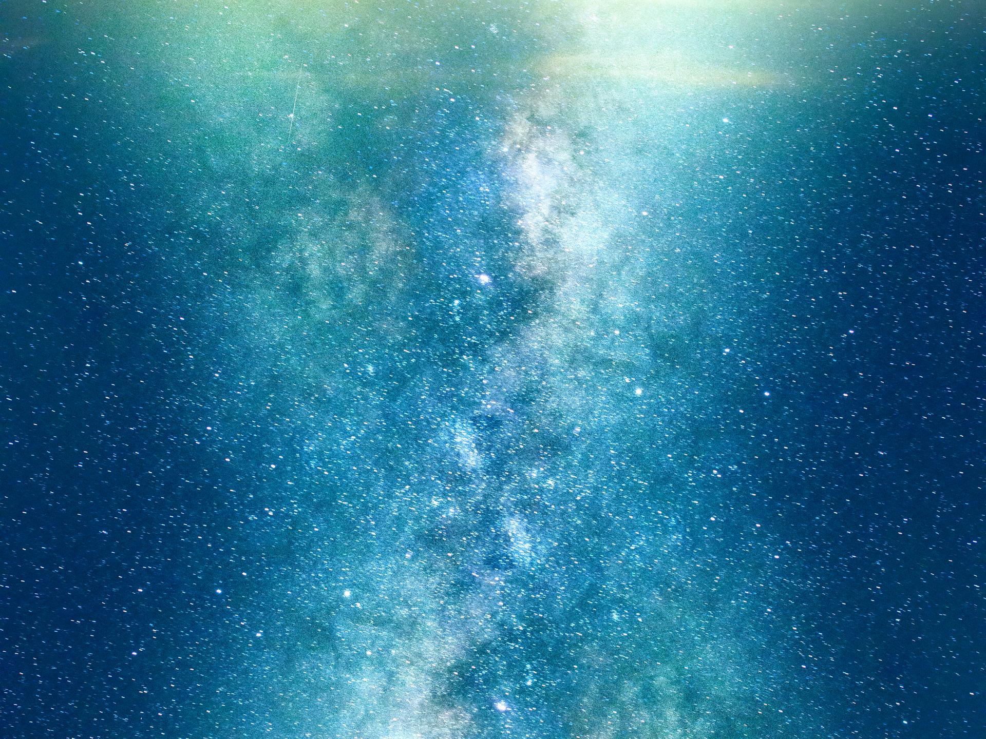 Blick in das Weltall mit unszähligen Sternen und Planeten