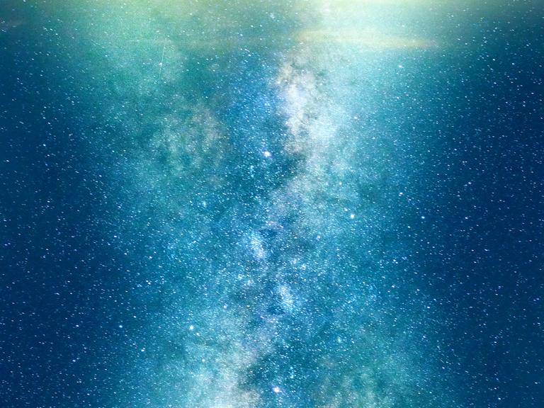 Blick in das Weltall mit unszähligen Sternen und Planeten