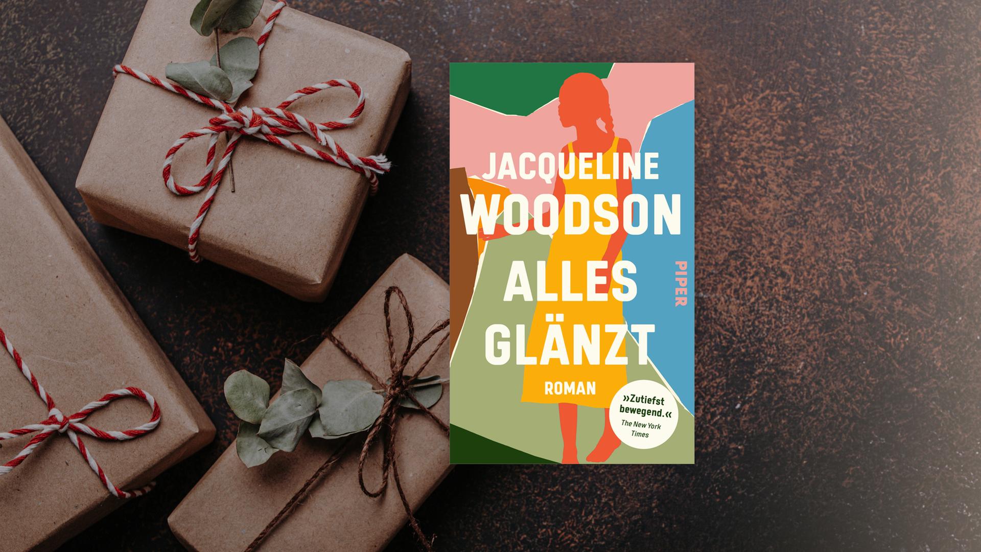 Das Cover des Buches "Alles glänzt" von Jacqueline Woodson auf einem adventlichen Hintergrund.