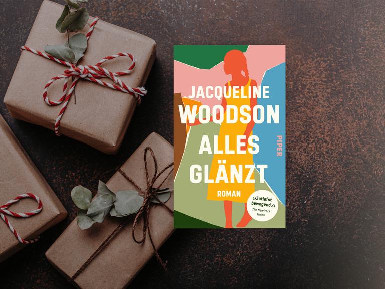 Das Cover des Buches "Alles glänzt" von Jacqueline Woodson auf einem adventlichen Hintergrund.