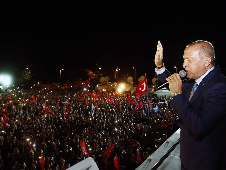 Turkey s President Recep Tayyip Erdogan delivers a statement on national television from his officia Turkey s President Recep Tayyip Erdogan delivers a statement on national television from his officia