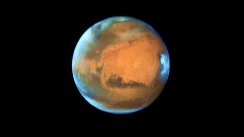 Der Planet Mars in Großaufnahme im dunklen Weltalll