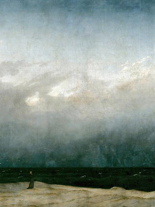 Das Gemälde "Der Mönch am Meer" von Caspar David Friedrich, eine kleine Mönchssilhouette steht vor einer Meereslandschaft.