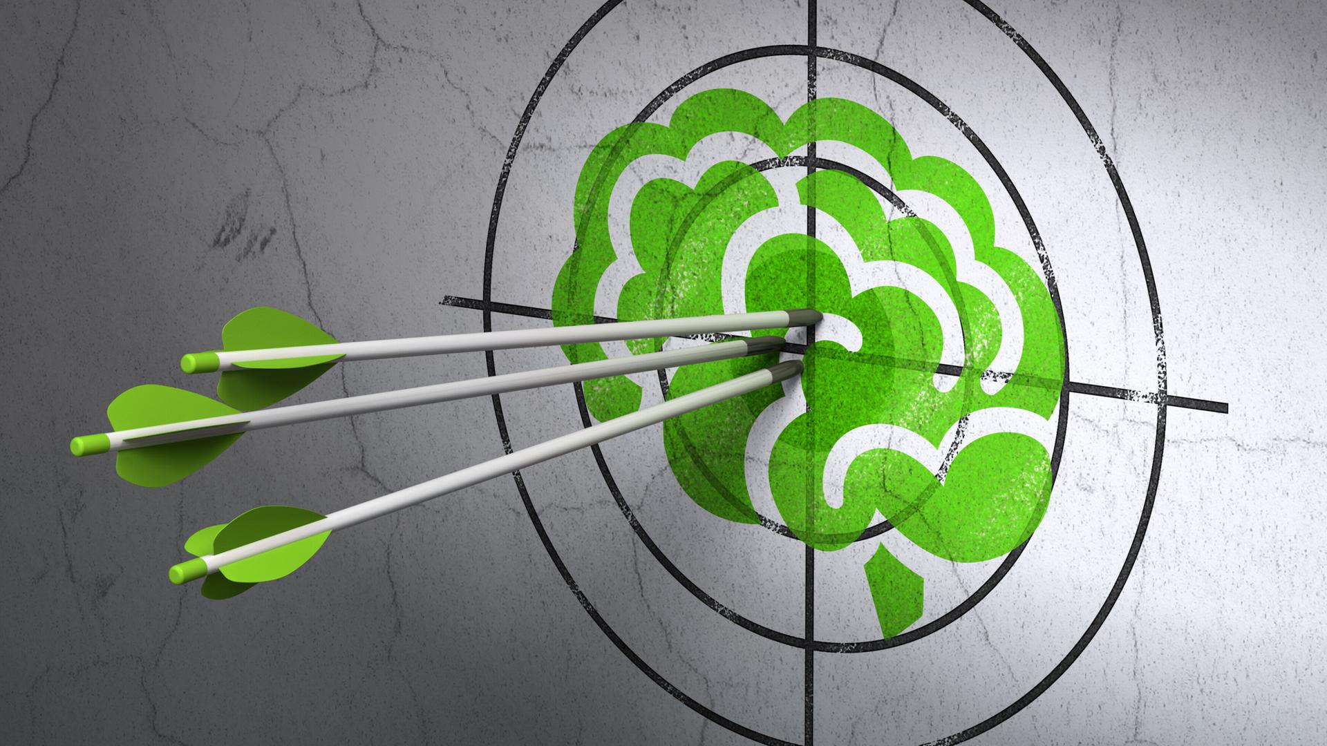 Success Science concept: arrows hitting the center of Green Brain target on wall background (maxkabakov)