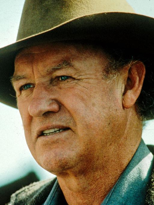 Der US-Schauspieler Gene Hackman als Cowboy  im Film "Erbarmungslos", einem Western aus dem Jahr 1992, bei dem Clint Eastwood Regie führte.