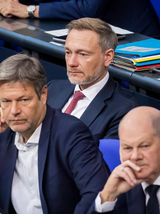 Olaf Scholz (SPD), Christian Lindner (FDP) und Robert Habeck (Grüne) bei einer Sitzung im Bundestag. 