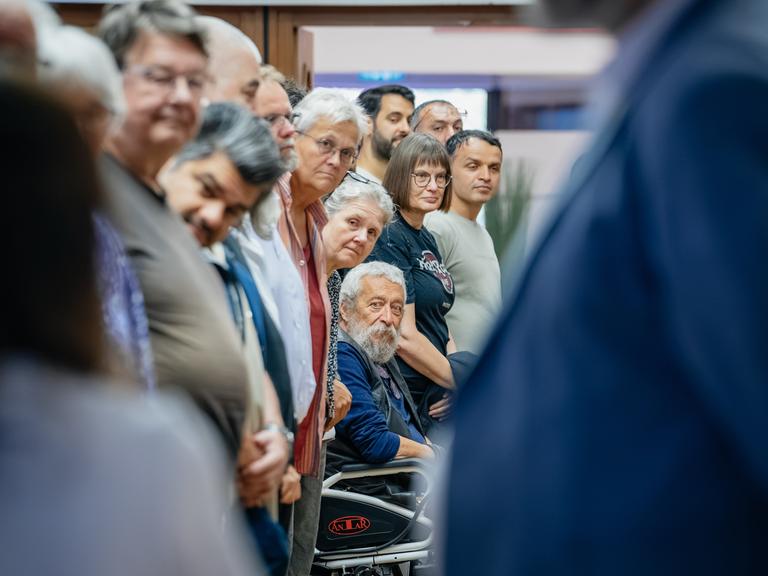 Teilnehmer einer Diskussionsveranstaltung in Essen Teilnehmer einer Diskussionsveranstaltung in Essen