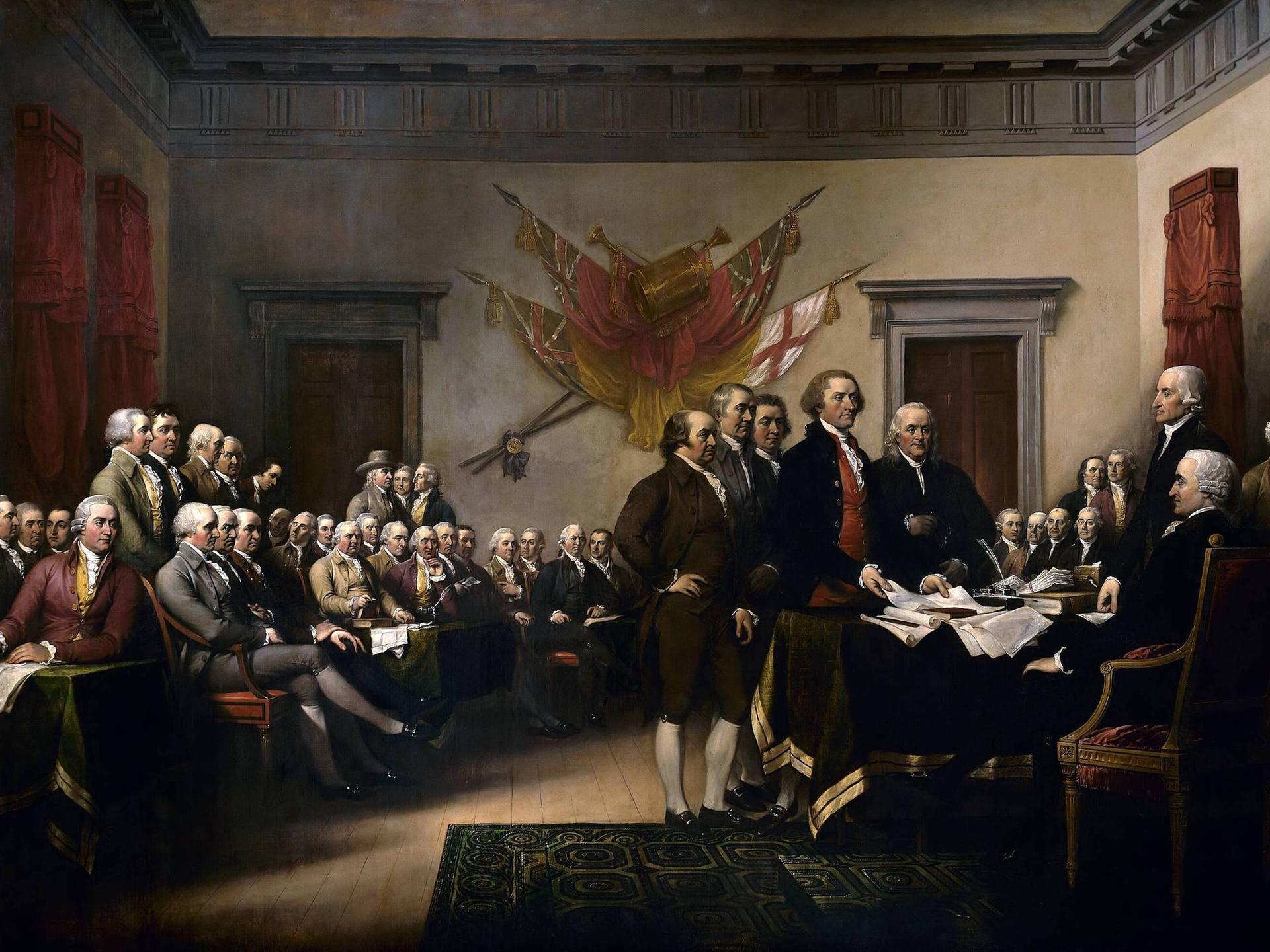 „Die Unabhängigkeitserklärung“ von John Trumbull (1756–1843). John Trumbulls Gemälde zeigt den fünfköpfigen Redaktionsausschuss der Unabhängigkeitserklärung, der dem Kongress sein Werk vorlegt. Das Original hängt in der Rotunde des US-Kapitols.