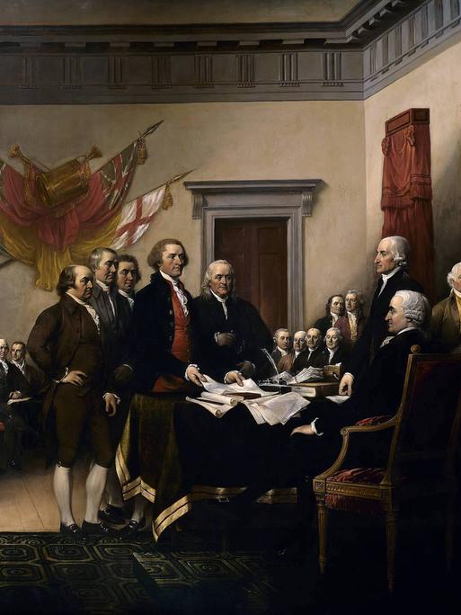 „Die Unabhängigkeitserklärung“ von John Trumbull (1756–1843). John Trumbulls Gemälde zeigt den fünfköpfigen Redaktionsausschuss der Unabhängigkeitserklärung, der dem Kongress sein Werk vorlegt. Das Original hängt in der Rotunde des US-Kapitols.