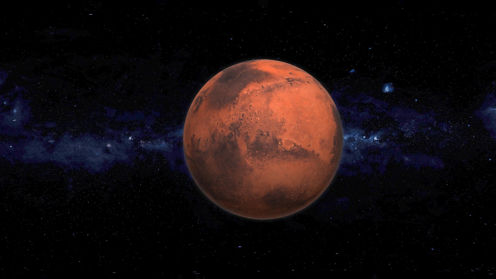 Der Planet Mars, dahinter ist die Milchstraße zu sehen. 