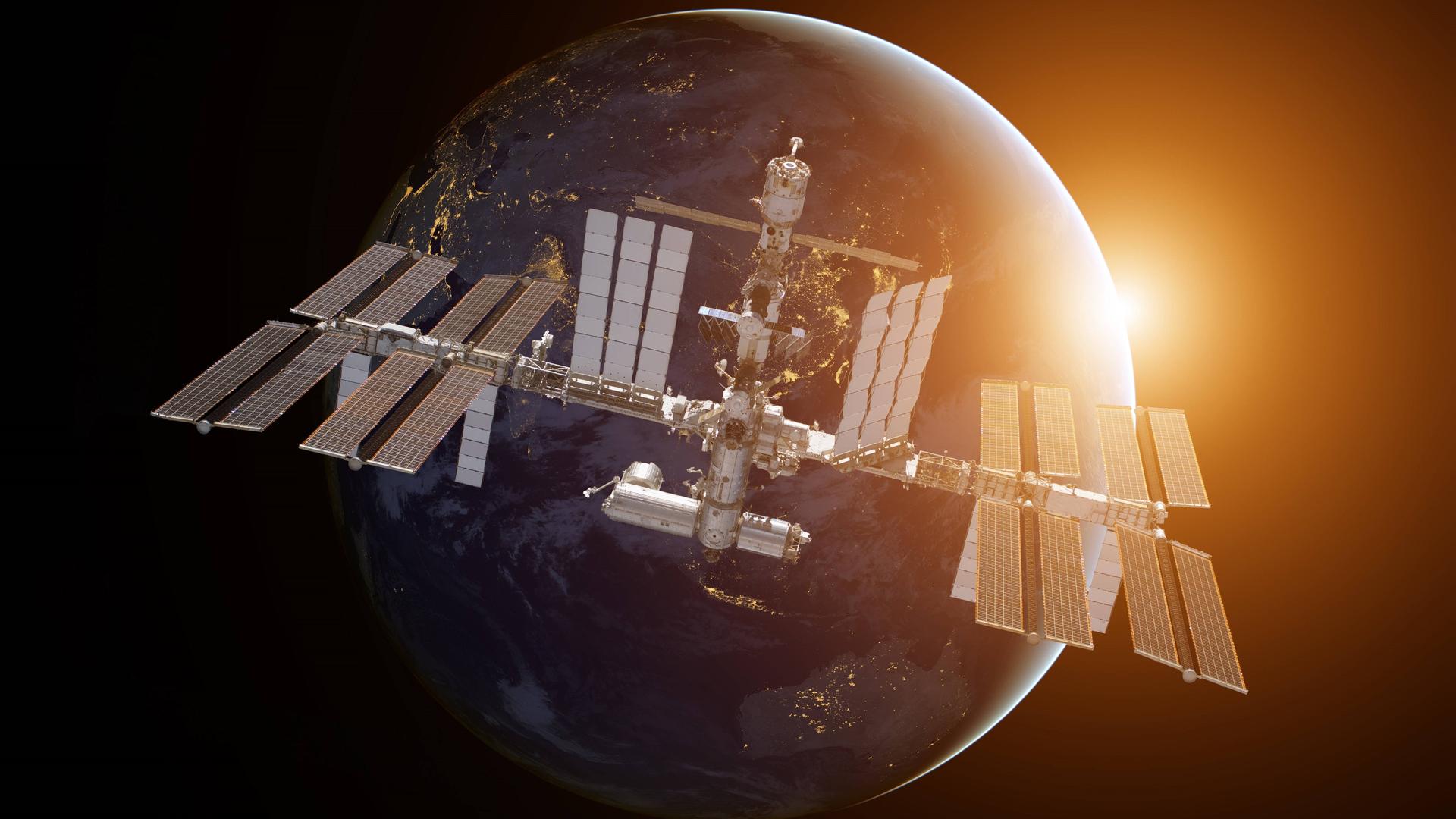 Die internationale Raumstation ISS im Weltall über der Erde.