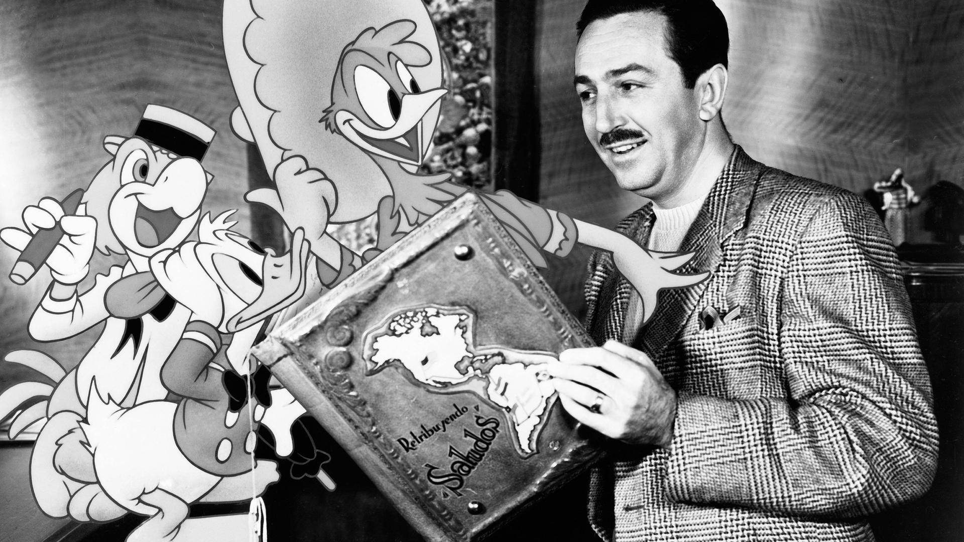 Walt Disney mit ein paar seiner Zeichentrickfiguren wie Donald Duck Walt Disney mit ein paar seiner Zeichentrickfiguren wie Donald Duck
