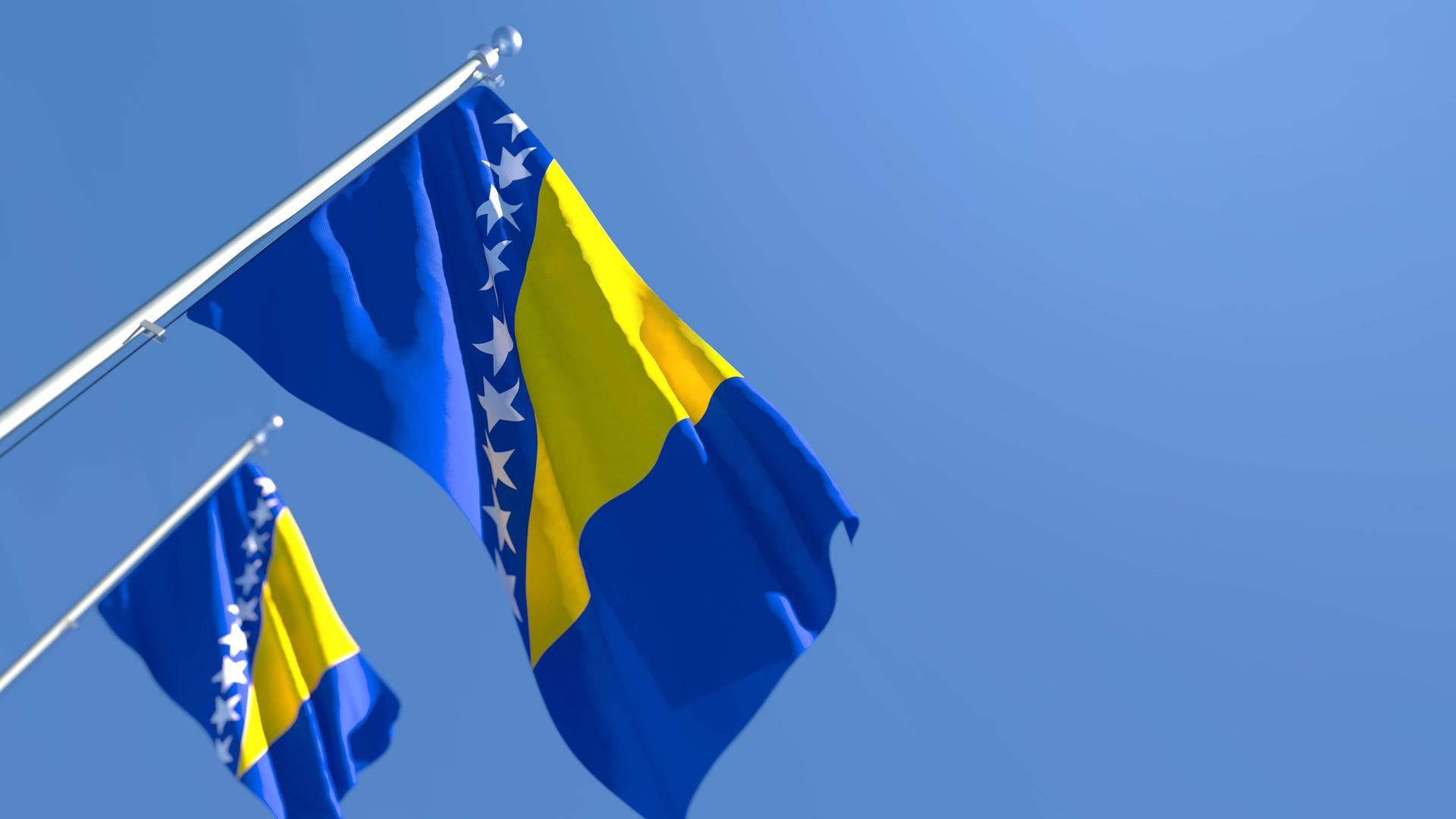 3D rendering of the national flag of Bosnia and Herzegovina waving in the wind against a blue sky , 33004266.jpg, bosnia