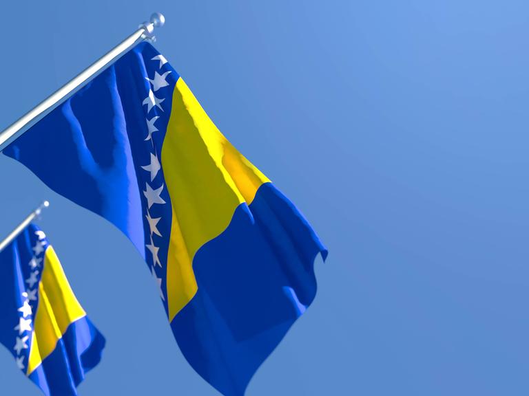 3D rendering of the national flag of Bosnia and Herzegovina waving in the wind against a blue sky , 33004266.jpg, bosnia