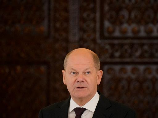German Chancellor Olaf Scholz speaks during joint statements with Romanian President Klaus Iohannis at the Cotroceni Presidential Palace in Bucharest, Romania, Monday, April 3, 2023. (AP Photo/Andreea Alexandru)