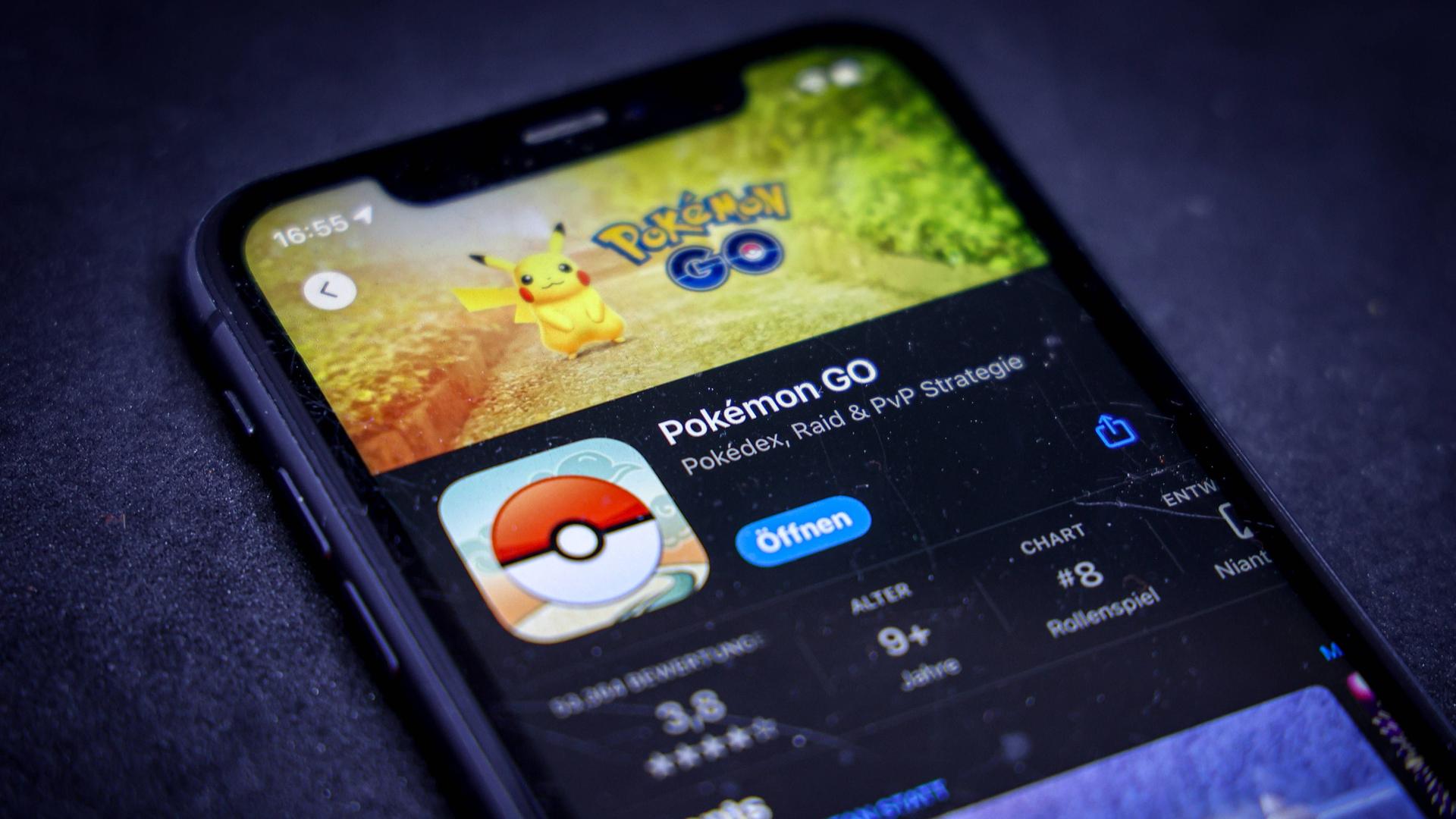 In einem App Store ist Pokemon GO auf einem iPhone. In einem App Store ist Pokemon GO auf einem iPhone.
