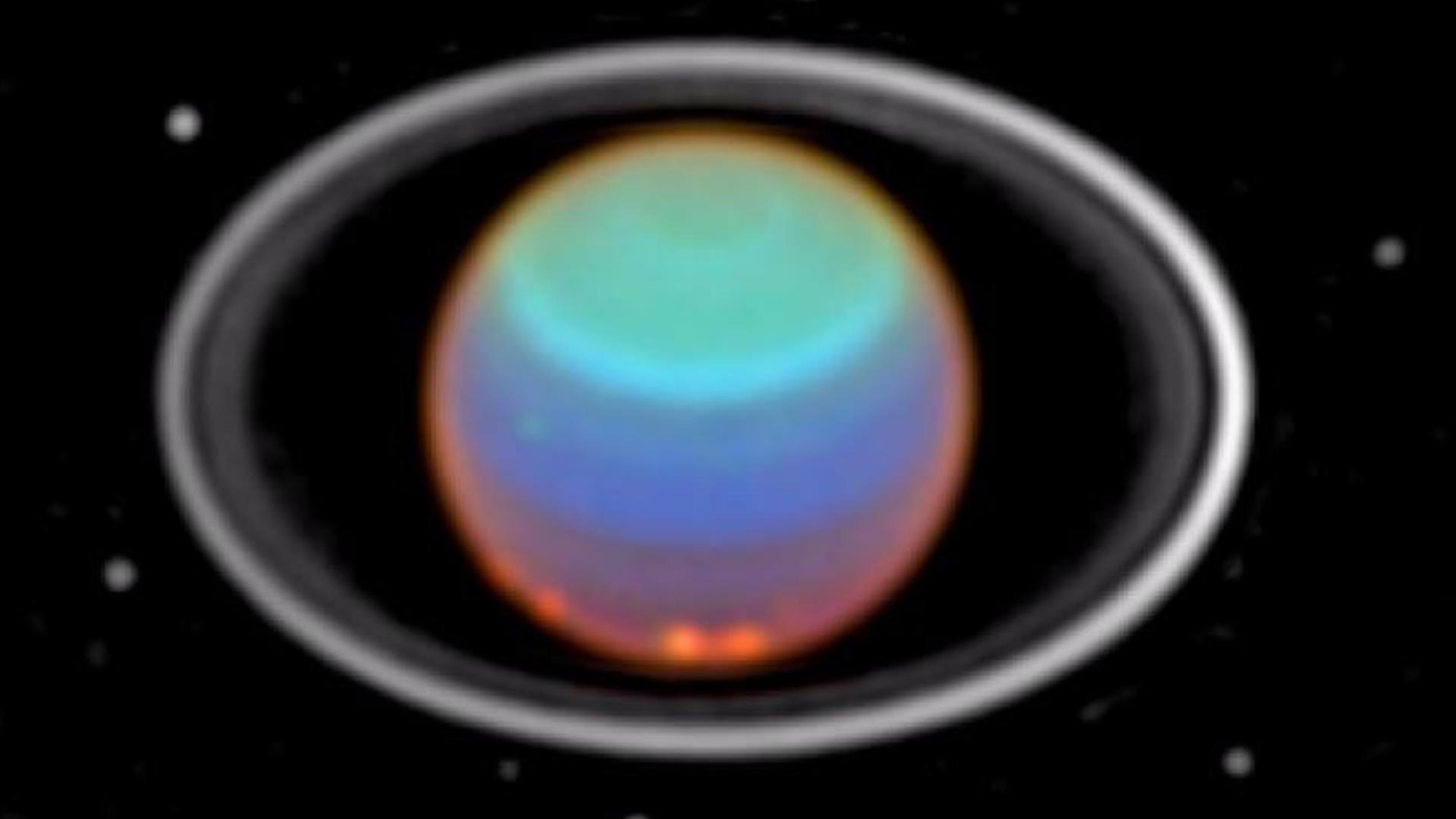 Der Planet Uranus, seine Ringe und einiger seiner Monde – aufgenommen vom Hubble-Weltraumteleskop. (Hubbe/NASA/ESA)