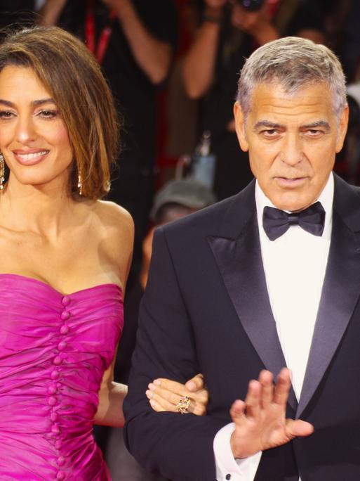 Amal Alamuddin Clooney und George Clooney beim Filmfestival Venedig, Italien