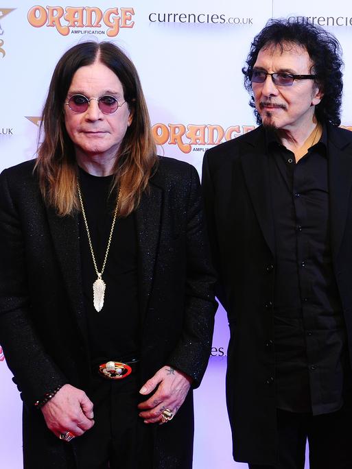 Ozzy Osbourne, Tony Iommi und Geezer Butler von Black Sabbath bei der Verleihung von Musikpreisen in London 2013
