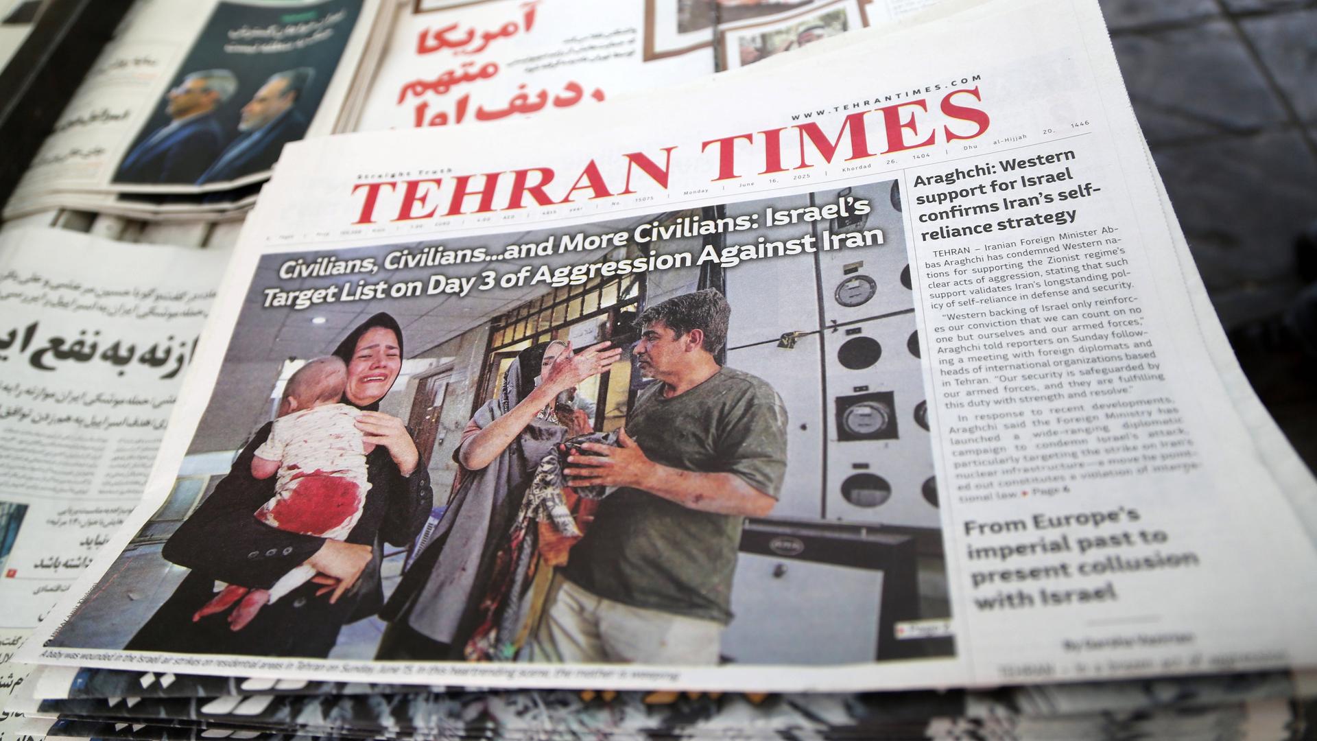 Berichte von iranischen Tageszeitungen zeigen die Folgen der Raketenangriffe zwischen Israel und dem Iran. Berichte von iranischen Tageszeitungen zeigen die Folgen der Raketenangriffe zwischen Israel und dem Iran.