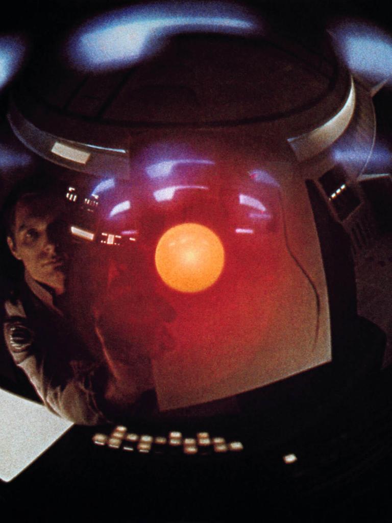 Szene aus "Odyssee im Weltraum" von Stanley Kubrick. Das Gesicht eines Mannes spiegelt sich in Glas. 