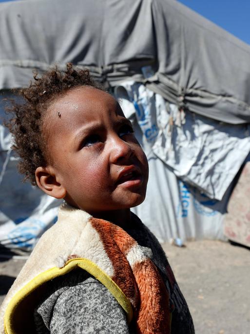 Junge im Flüchtlingscamp Dharawan, einenm Vortort der jemenitischen Hauptstadt Sanaa, aufgenommen im Dezember 2022