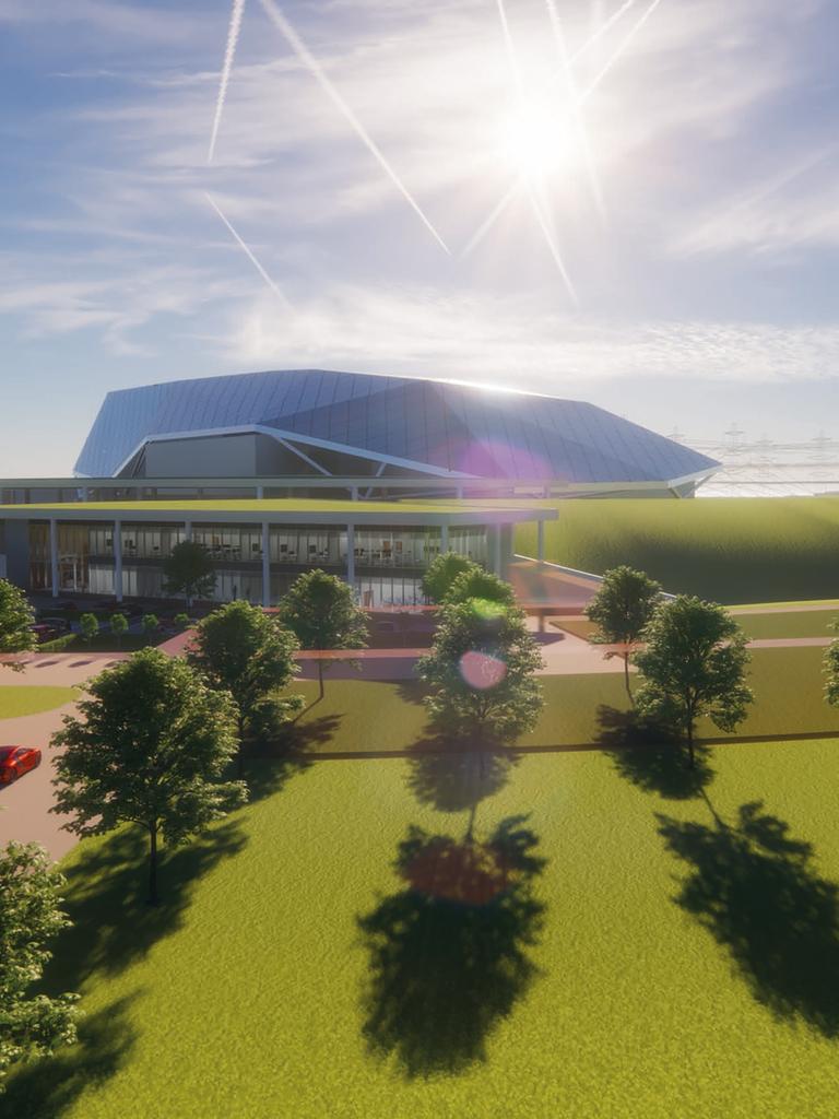 Ein Computerrendering zeigt die Visualisierung eines neuartigen Atomkraftwerks in grüner Landschaft.