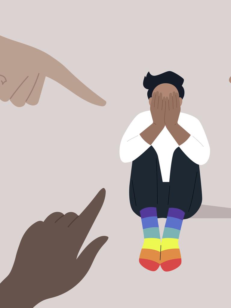 Illustration von Fingern, die aus unterschiedlichen Ecken auf eine LGBTQ Person zeigen, die regenbogenfarbene Socken trägt. Die Person verdeckt ihr Gesicht mit ihren Händen.