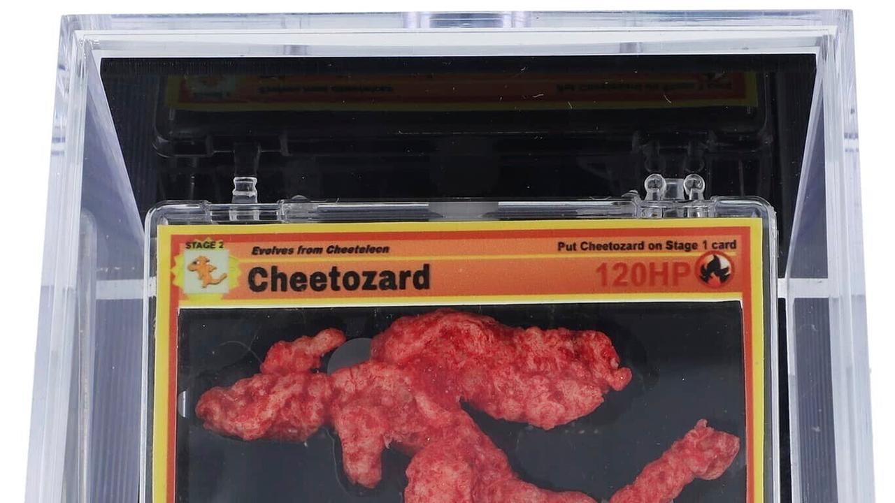 This undated photo provided by Goldin Auctions shows a Cheeto shaped like the PokÃ©mon Charizard that has sold at auction for $87,840. (Goldin Auctionsvia AP)