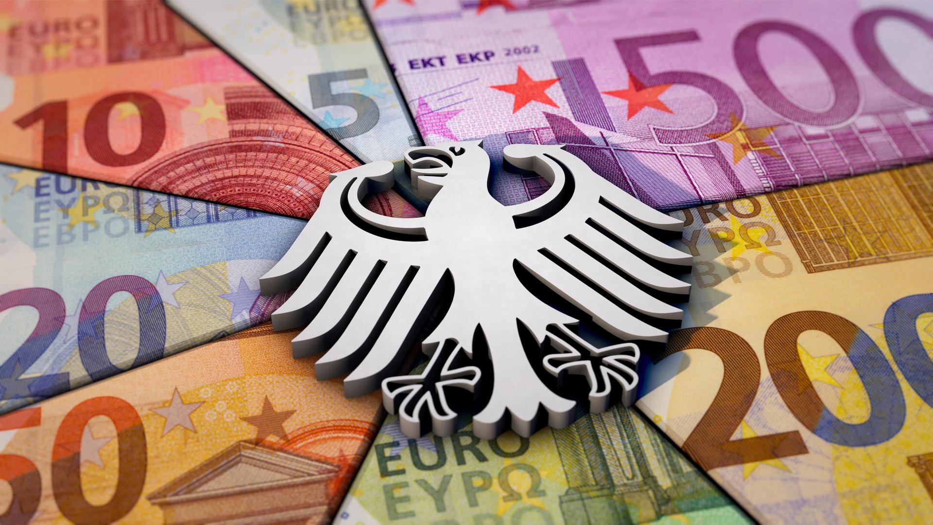 Deutscher Bundeshaushalt - Symbolbild zeigt einen Bundesadler auf Euro-Geldscheinen.
