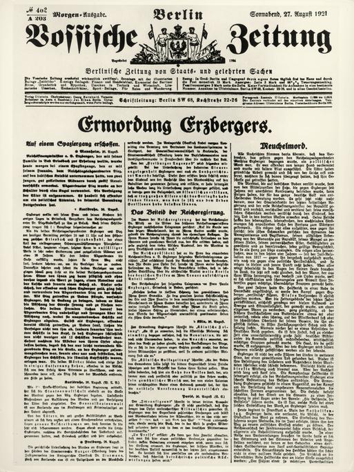 Fotografie einer Zeitung, die in Frakturschrift meldet "Ermordung Erzbergers"