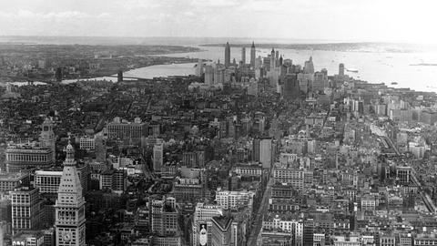 A view looking southward from the Empire State Building, shows lower Manhattan, and the rear view of the famous skyline in New York City, USA from around Sept. 29, 1938. The cluster of buildings is the financial district. In foreground is one of New YorkÃ¢ÂÂs first skyscrapers, the Flat Iron building, at the junction of Broadway, bearing left and Fifth Avenue. At right is the mouth of the Hudson River, flowing past Liberty Island and the Atlantic Ocean is out beyond the narrows on the left. STOCK PHOTO (AP Photo)