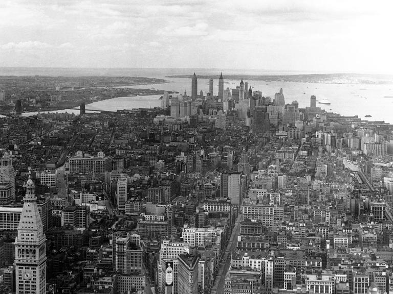 A view looking southward from the Empire State Building, shows lower Manhattan, and the rear view of the famous skyline in New York City, USA from around Sept. 29, 1938. The cluster of buildings is the financial district. In foreground is one of New YorkÃ¢ÂÂs first skyscrapers, the Flat Iron building, at the junction of Broadway, bearing left and Fifth Avenue. At right is the mouth of the Hudson River, flowing past Liberty Island and the Atlantic Ocean is out beyond the narrows on the left. STOCK PHOTO (AP Photo)