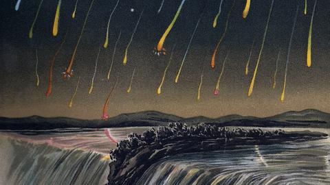 Bunte Sternschnuppen auf dunklem Hintergrund