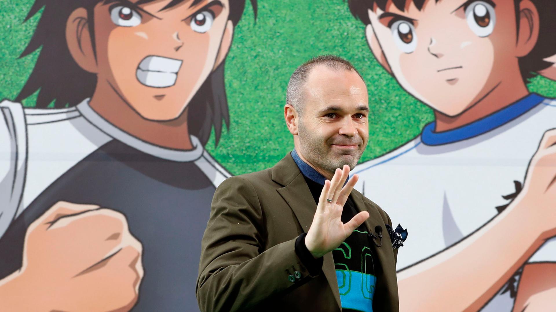 Vissel Kobe's Andres Iniesta attends an event featuring Japanese animation "Captain Tsubasa" at a train station in Tokyo Monday, March 4, 2019. (Shinji Kita/Kyodo News via AP)