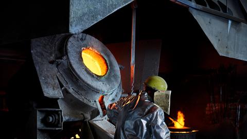 Blue-collar worker wearing protective workwear in steelmaking industry model released property released, CVF01761